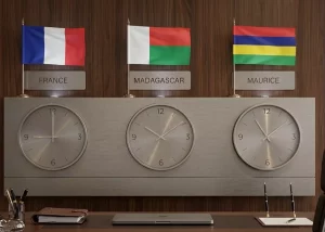 Horloges murales de bureau indiquant le décalage horaire entre la France, Madagascar et l'Île Maurice